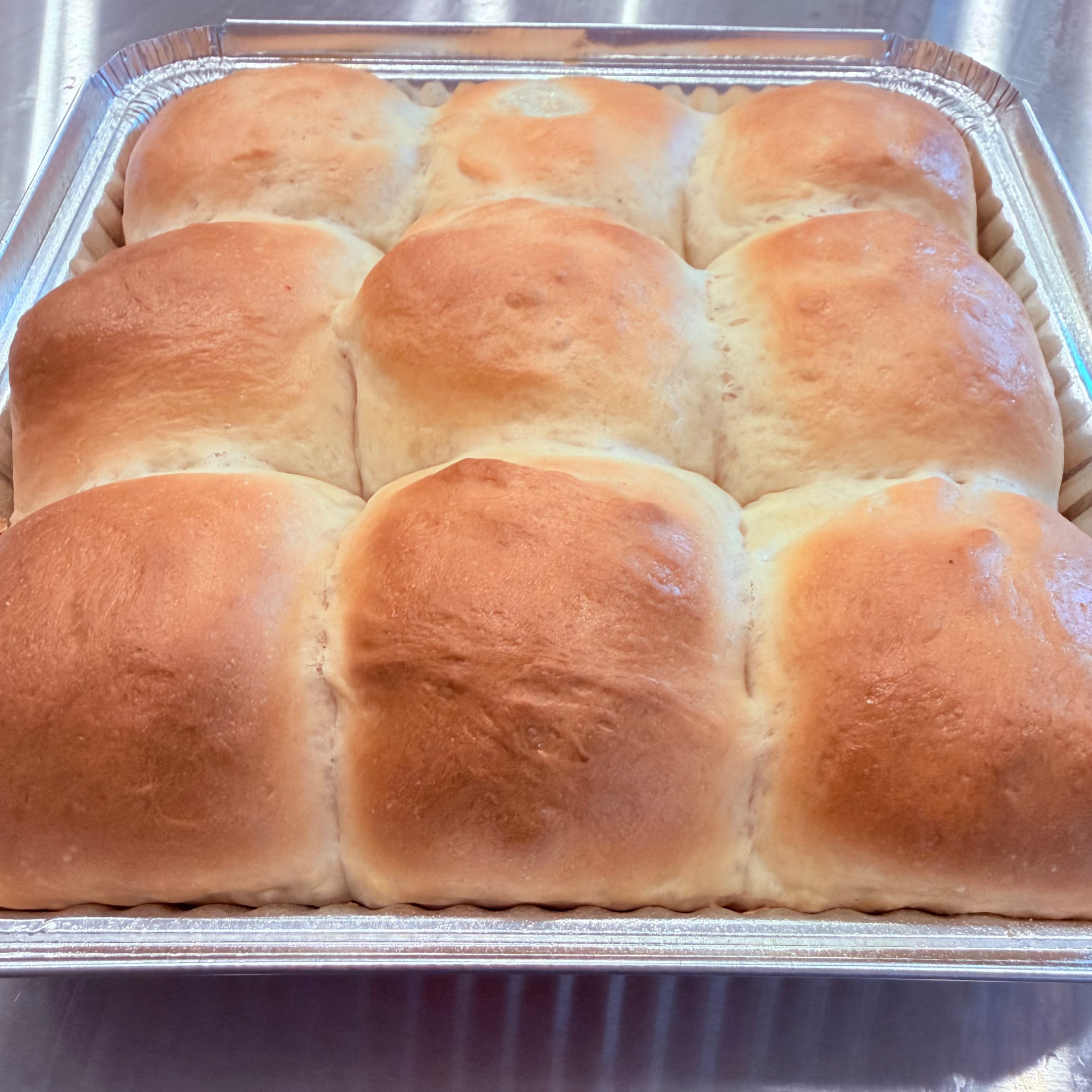 Slider Buns/Dinner Rolls — Soft, buttery pull-apart rolls baked golden in a pan. Pack of 9. Available to order for pickup from Mama Rozi's Bakehouse, LaGrange, KY.