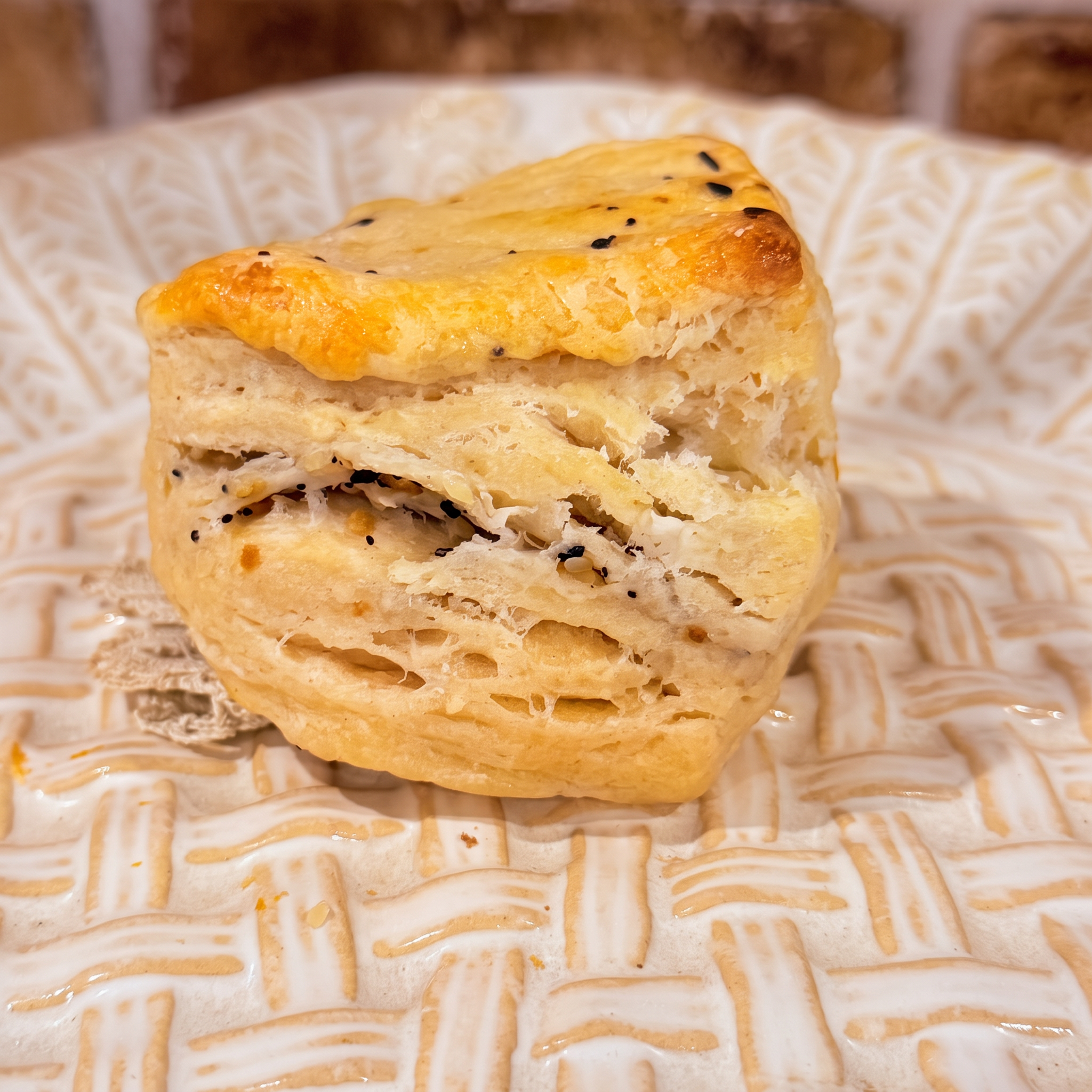 Flaky sesame and garlic biscuit topped with toasted sesame seeds — baked fresh at Mama Rozi's Bakehouse in LaGrange, KY